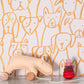 Image of Puppy Pile in Gold Wallpaper